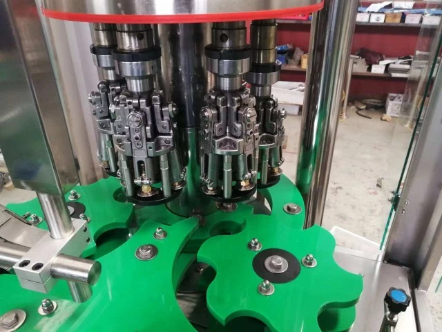 Compact 4-Head Ring-Pull Capping Machine For Glass Bottles 4500BPH suppliers Compact 4-Head Ring-Pull Capping Machine For Glass Bottles 4500BPH suppliers